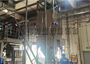 鈣粉自動噸袋投料站+管鏈式提升機現(xiàn)場